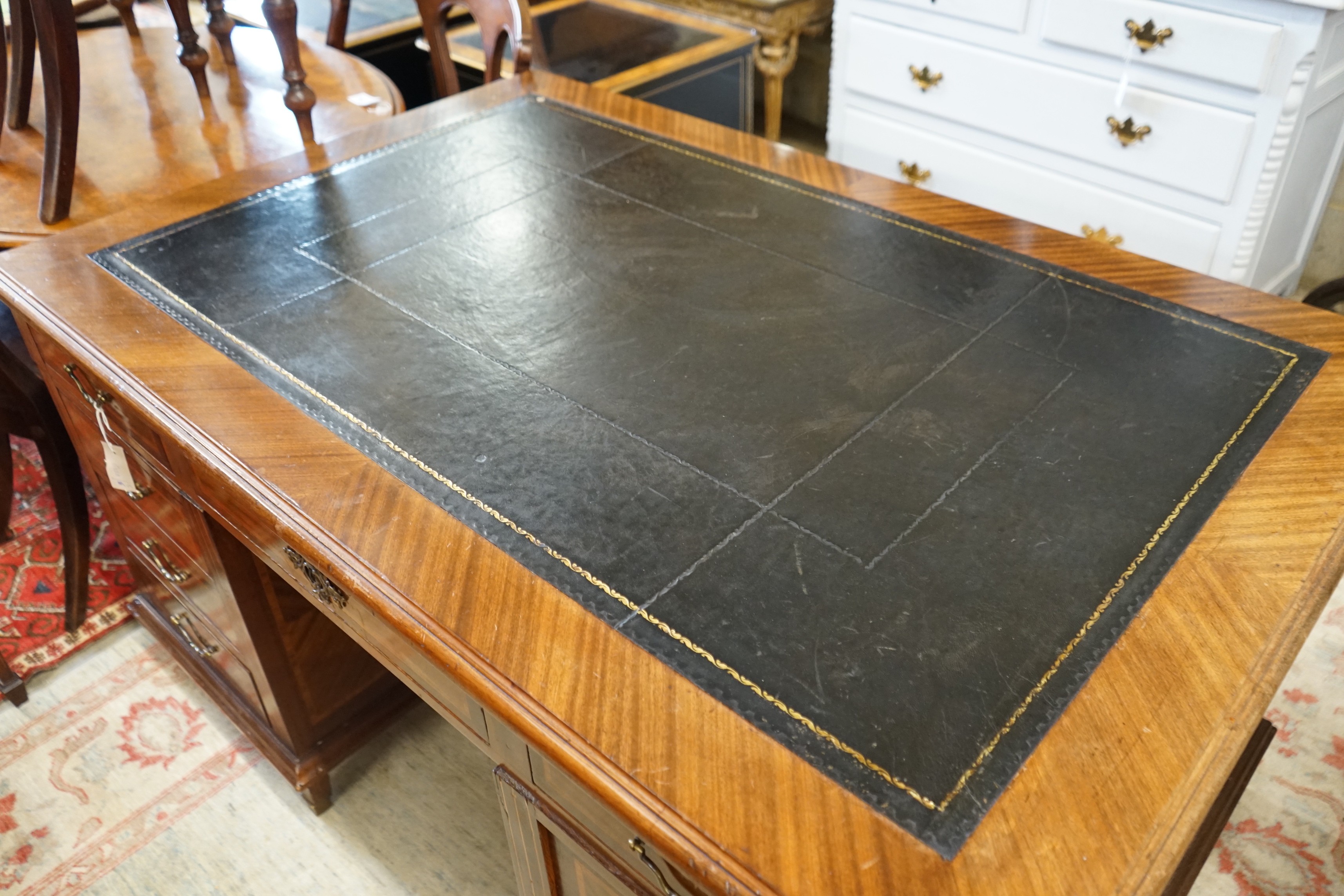 A mid 20th century French satinwood banded mahogany pedestal partner's desk, length 150cm, depth 98cm, height 79cm